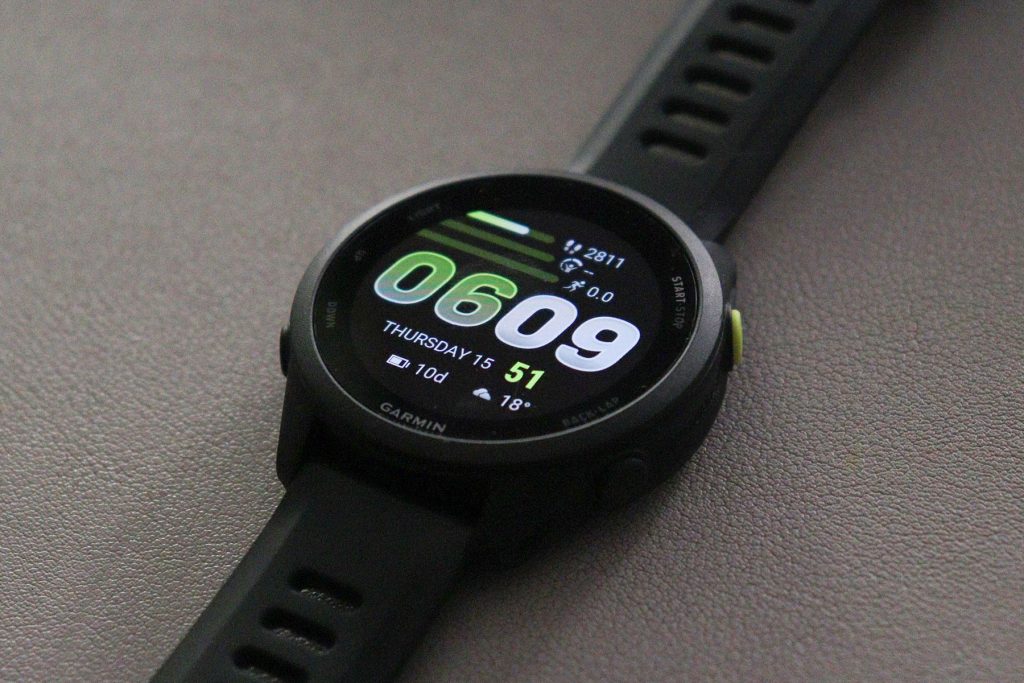 Closeup of Garmin Forerunner 70 and its default watch face